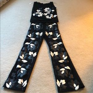 Beautiful ensemble with leather appliqué.